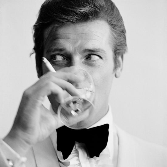 Queen Kerosin Acrylglasbild - Roger Moore JETZT KAUFEN